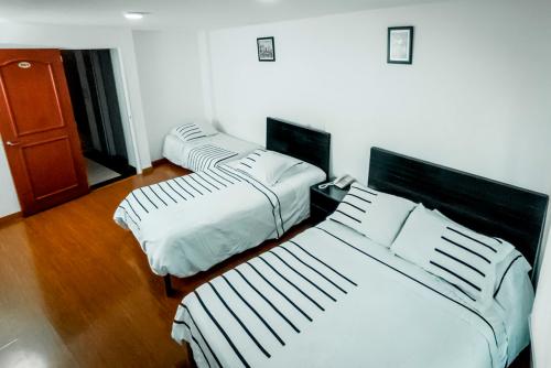 1567acomodacion-triple-en-hotel-bogota